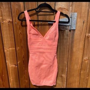 Super down XXS coral neon dress. Has cut in bottom in the back, not noticeable.